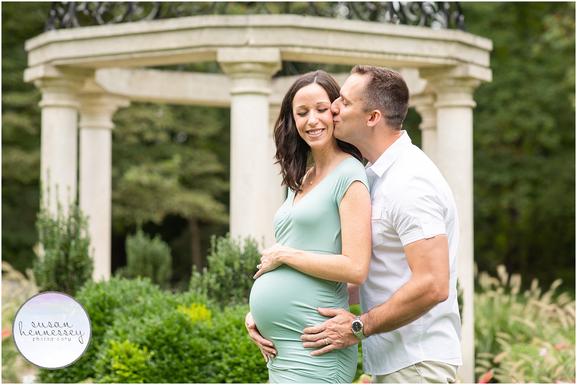 A pregnant couple at Sayen Gardens in Hamilton, NJ