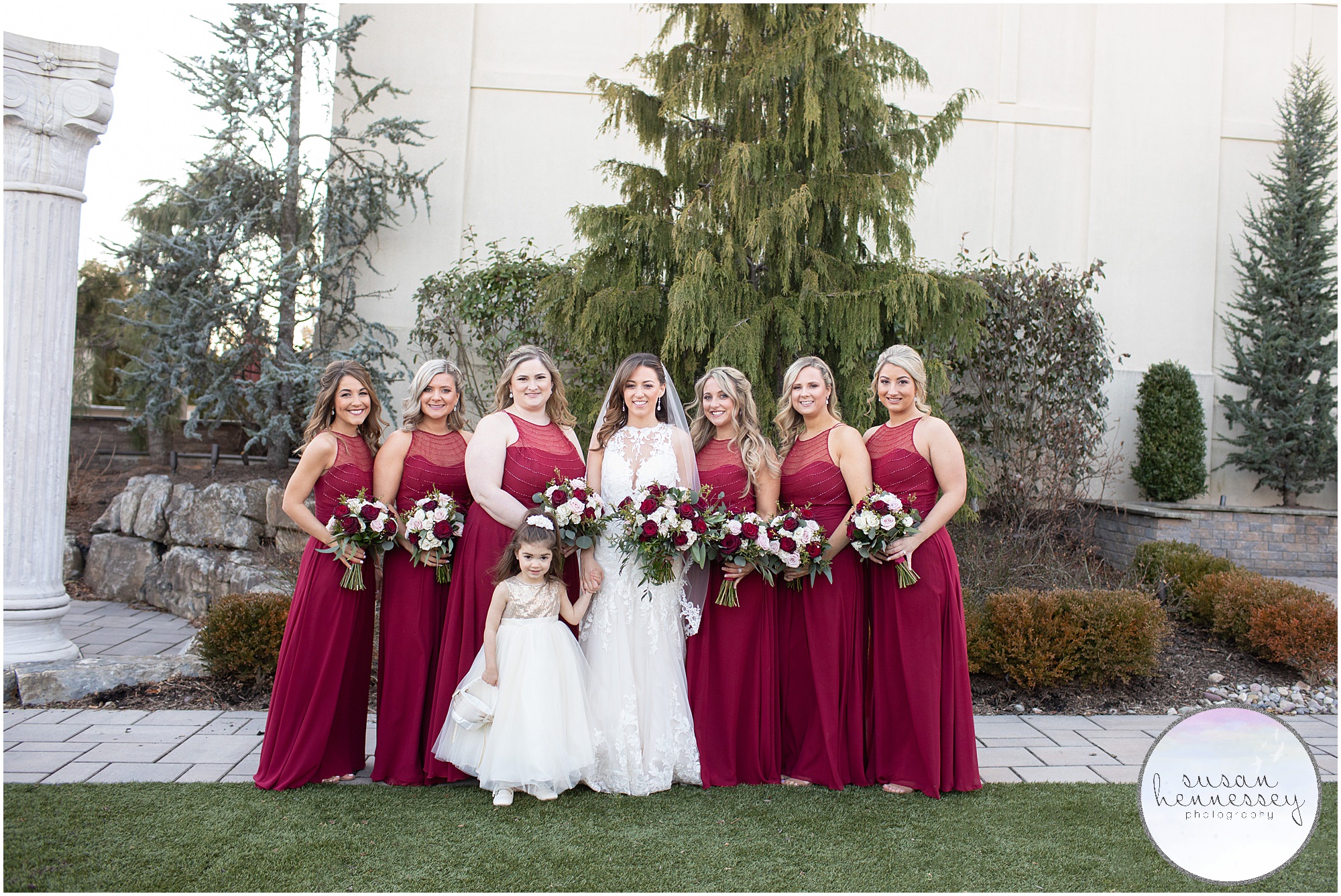 Bridesmaids in red at The Merion Wedding in Cinnaminson, NJ