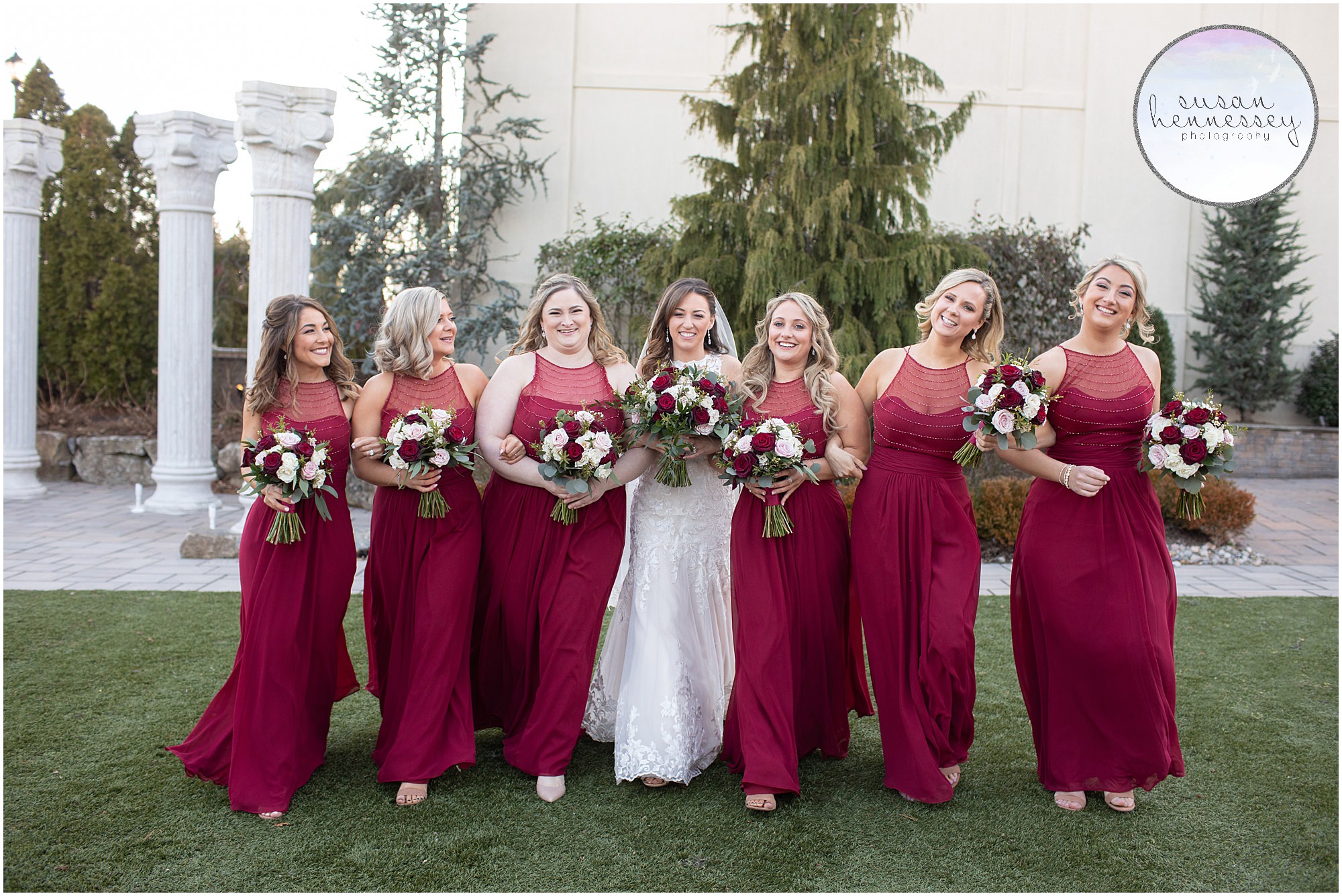 Bridesmaids in red at The Merion Winter Wedding