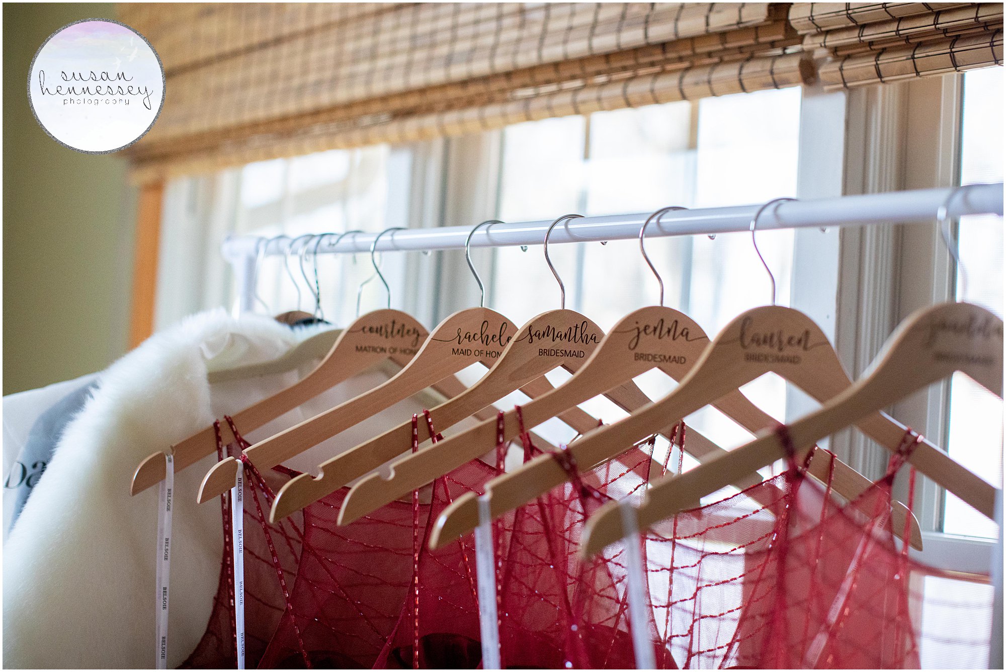 Personalized bridesmaid hangers at winter wedding