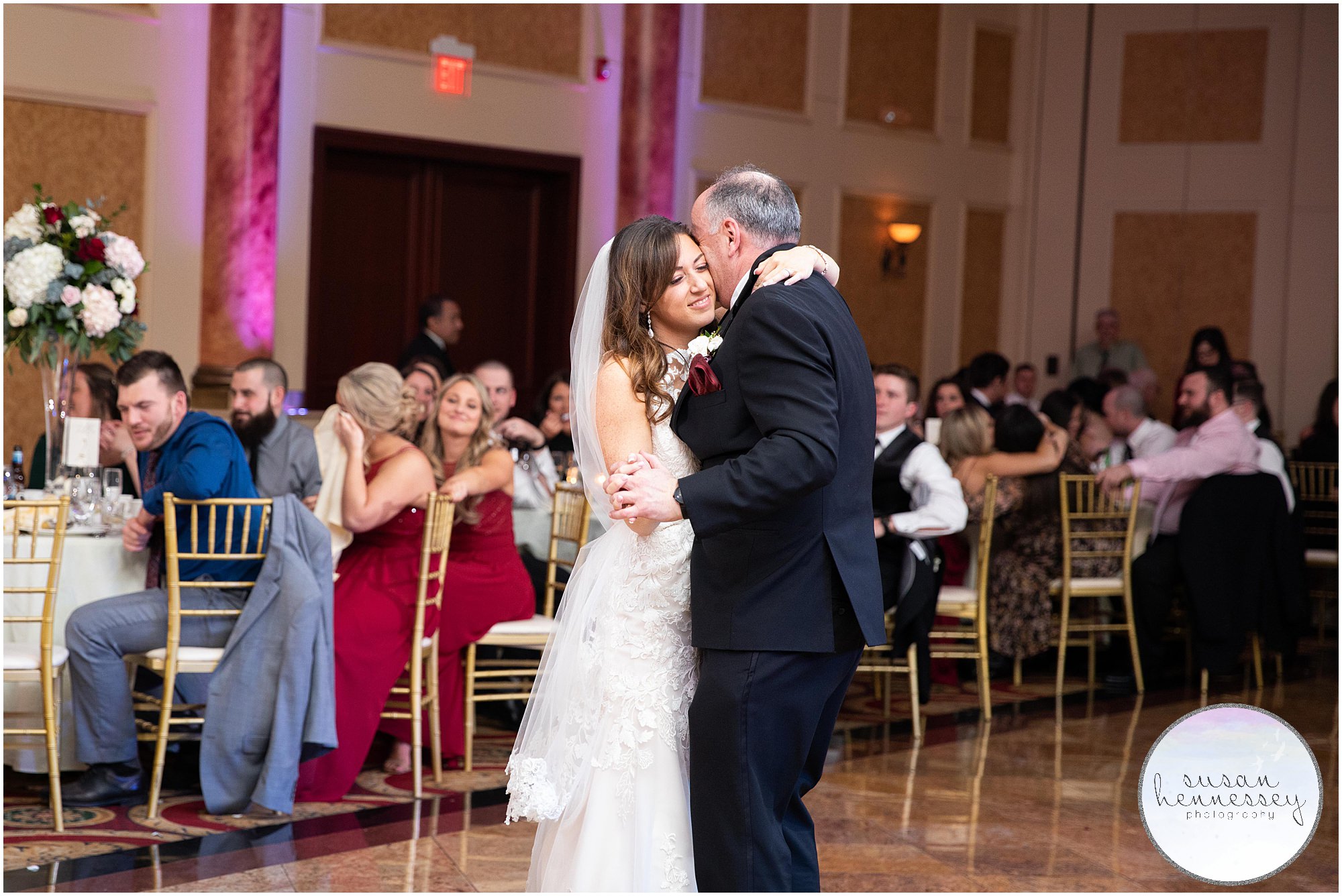 Bride dances with her father at wedding reception