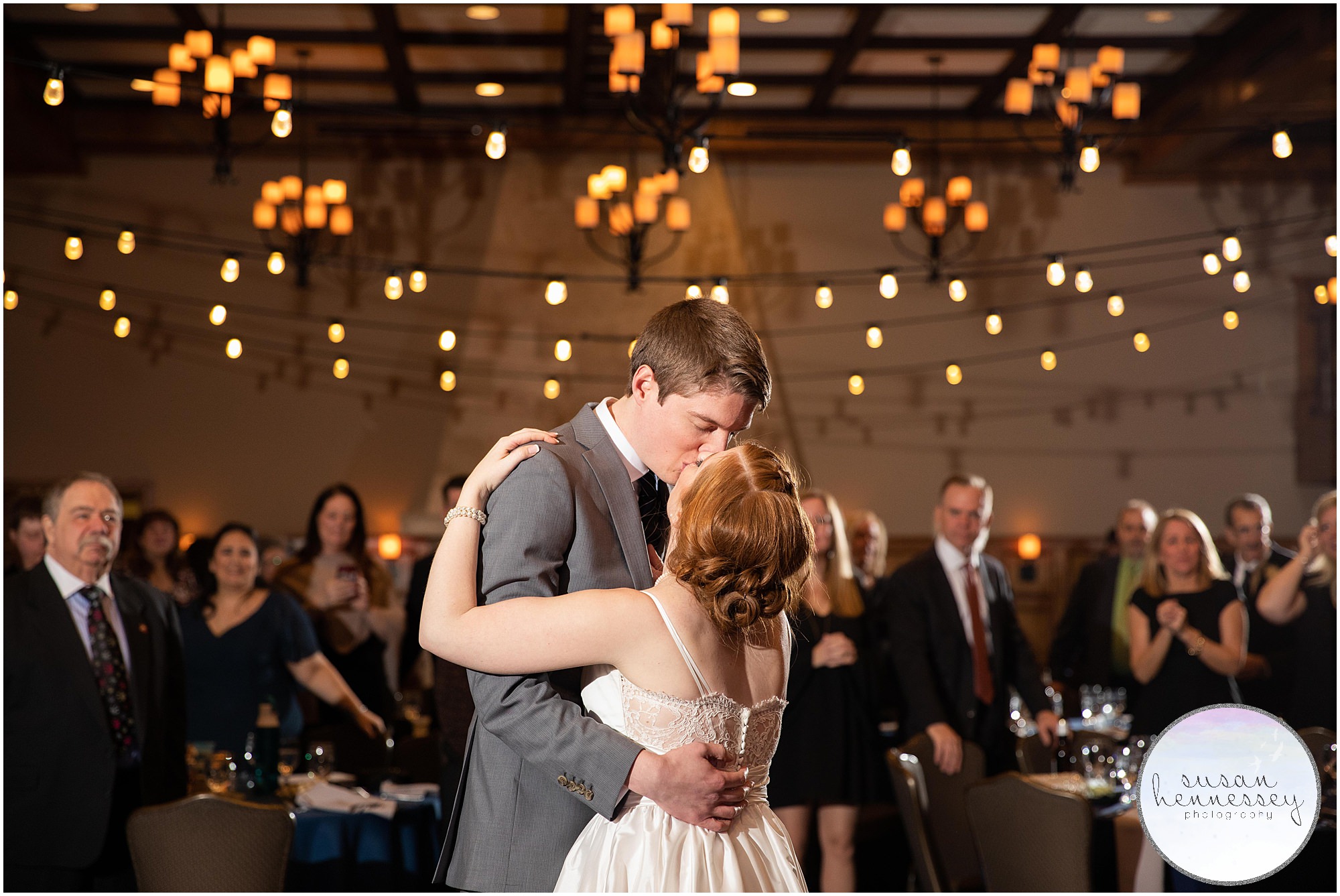 Couple kiss during their first dance at Moorestown Community House