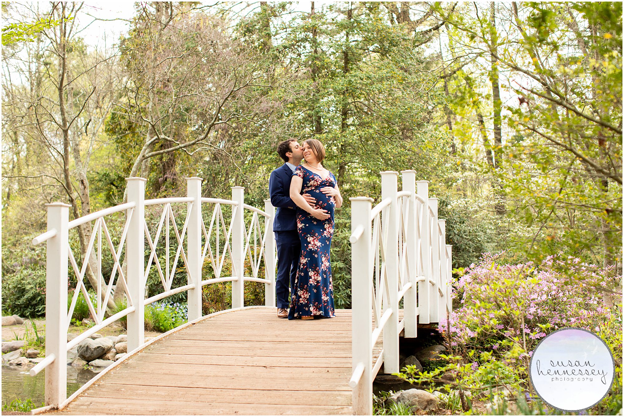 A pregnant mother and her husband at her maternity session at Sayen Gardens