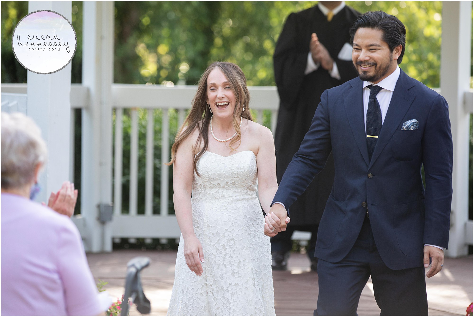 A couple has an intimate wedding ceremony at Sayen Gardens