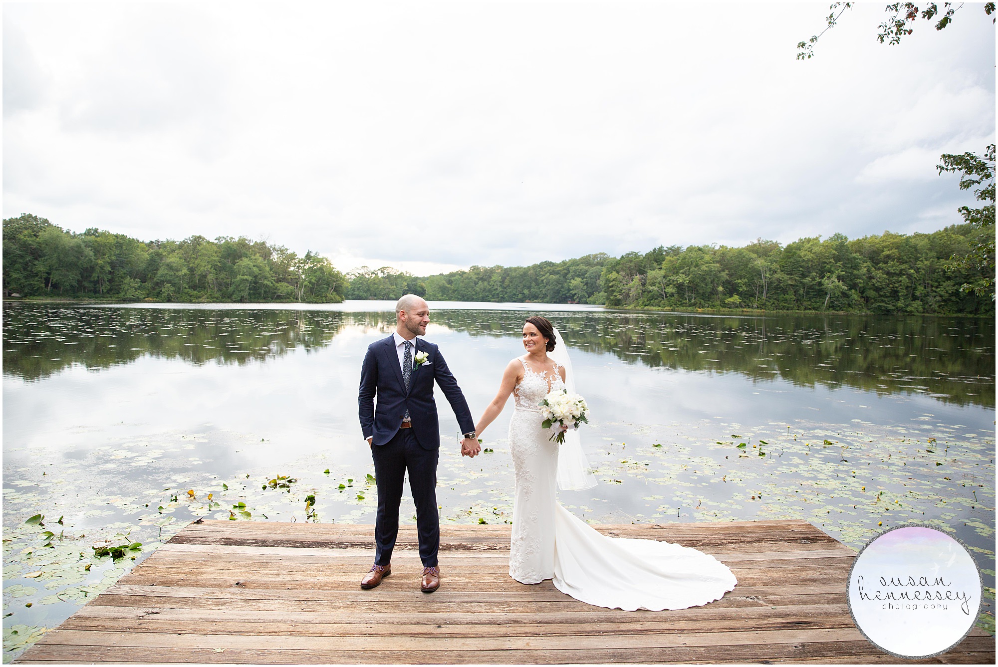 Bride and groom on lake