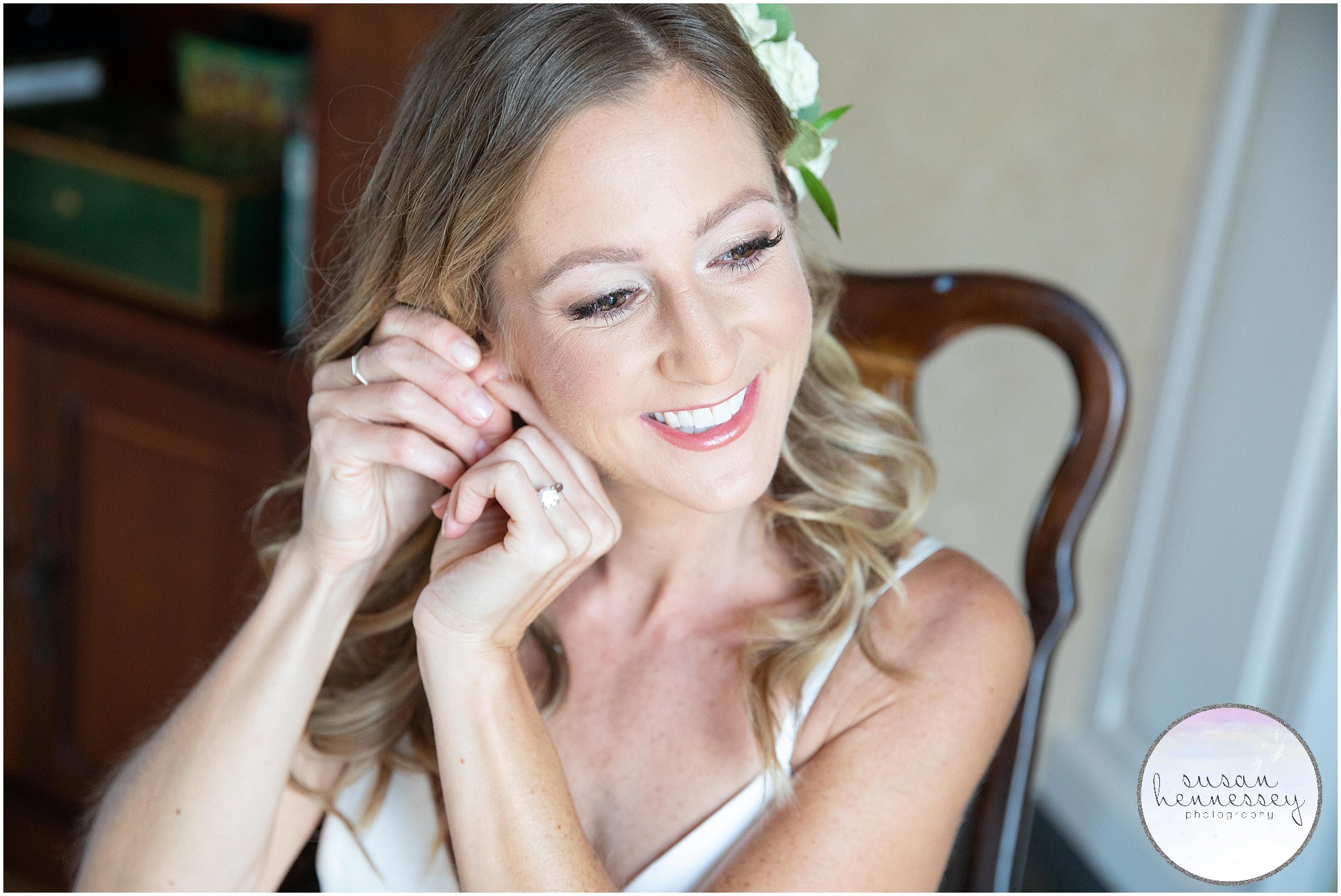Bride puts on her classic earrings for Jersey Shore microwedding