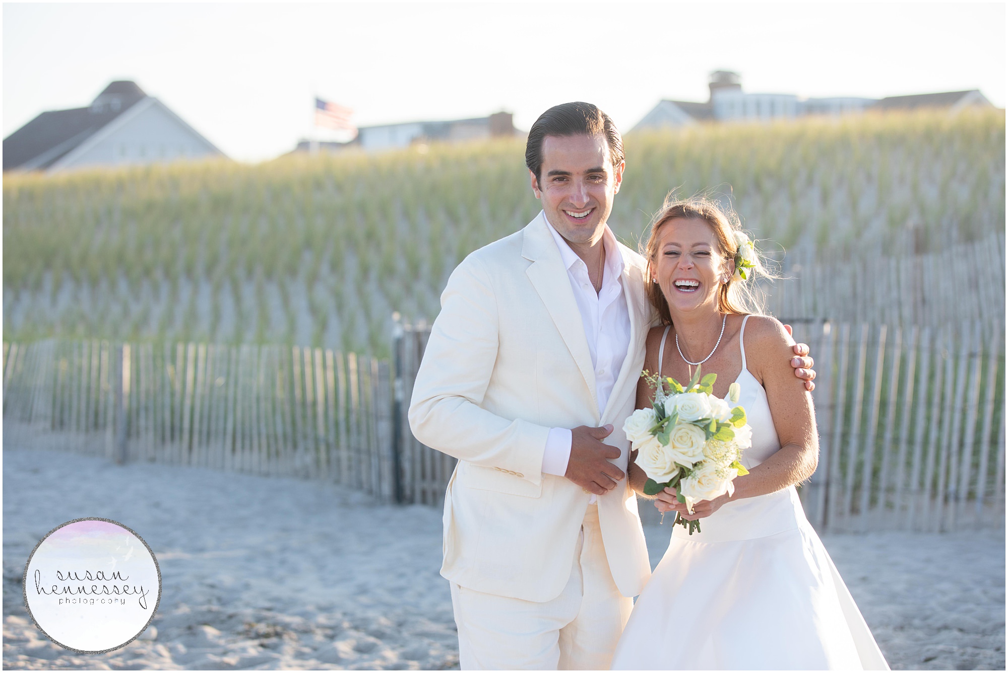 A happy couplelaugh at their microwedding in Bay Head, NJ