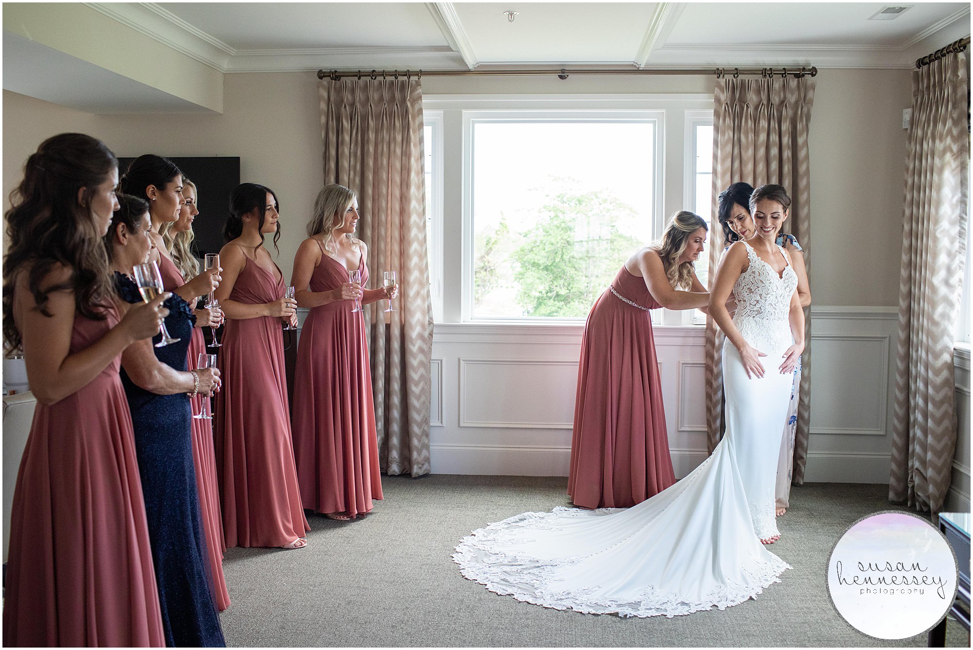 Bride dresses in the bridal suite at Atlantic City Country Club