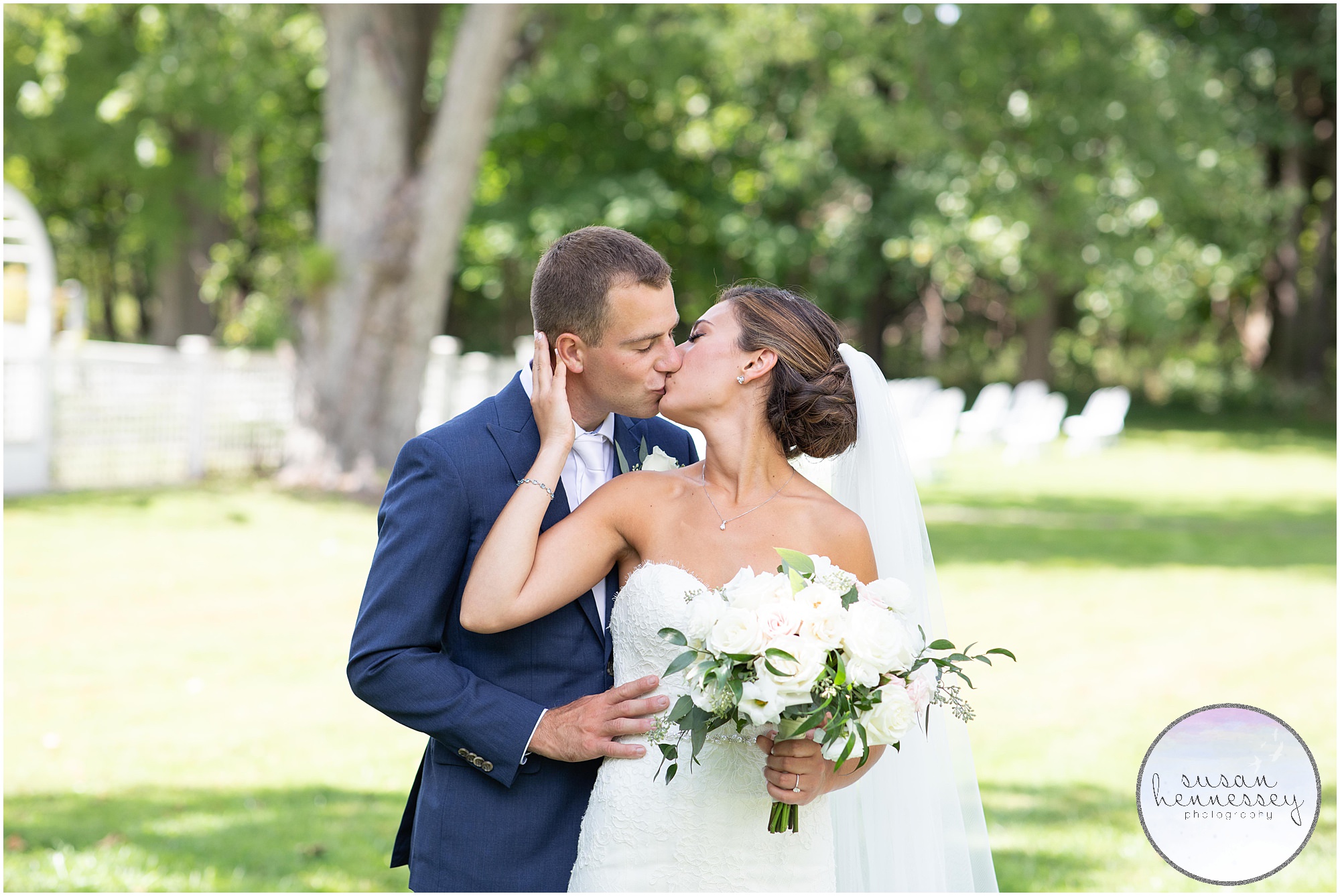 Bride and groom kiss at wedding amid COVID-19 pandemic