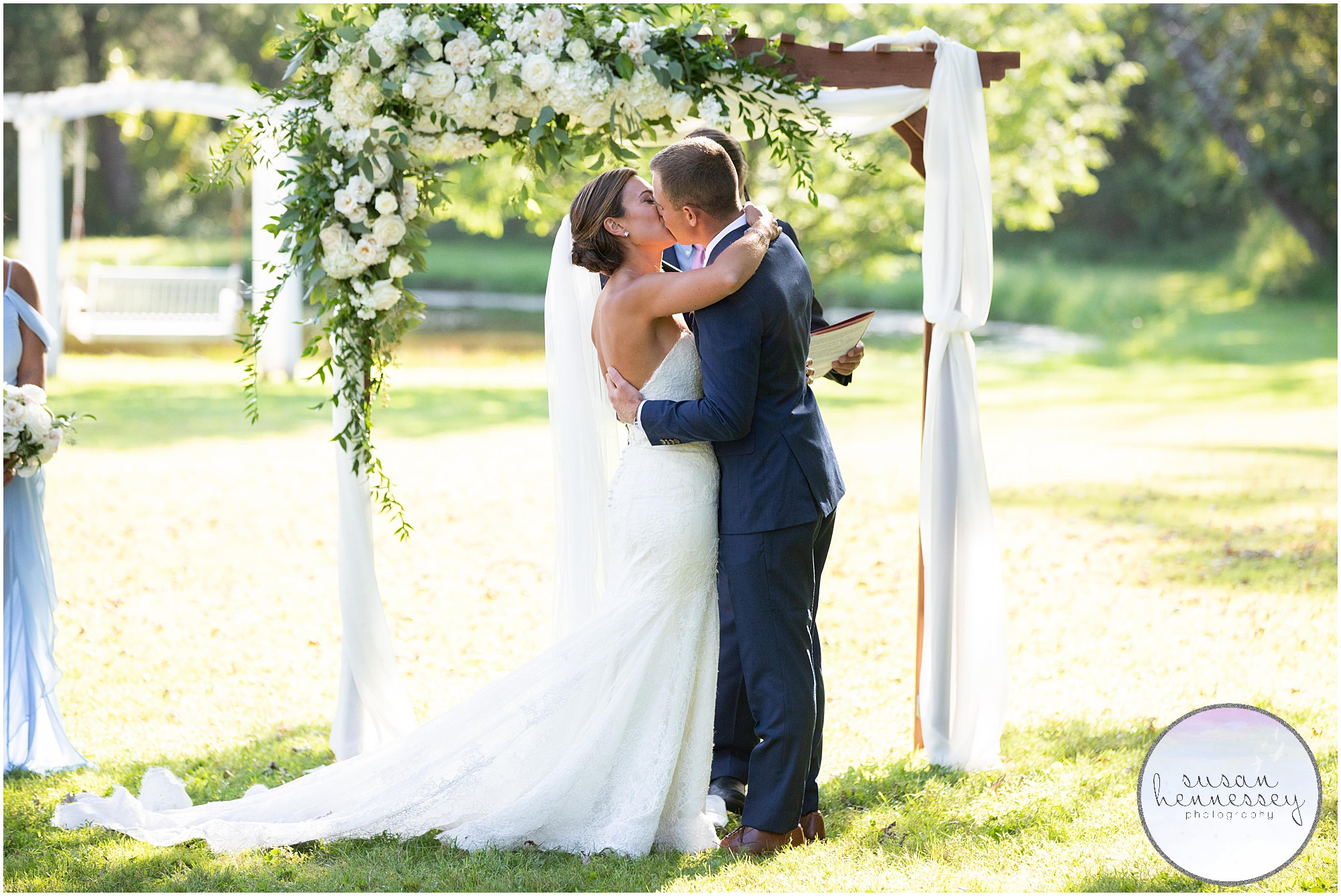 First kiss at Outdoor ceremony at Inn at Barley Sheaf Farm outdoor wedding