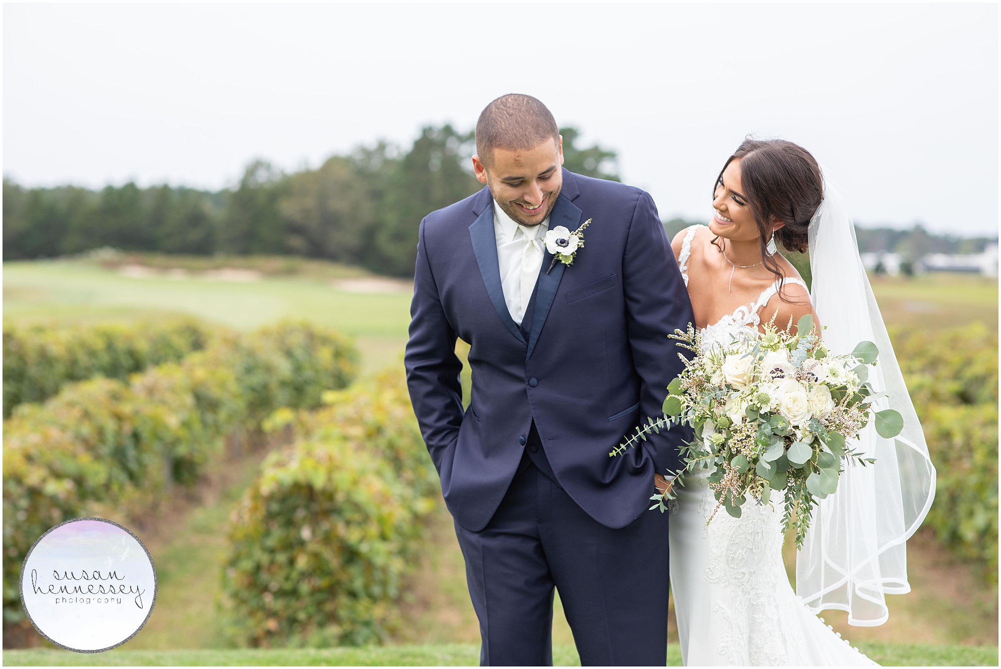 Bride and groom laugh during Renault Winery wedding portraits