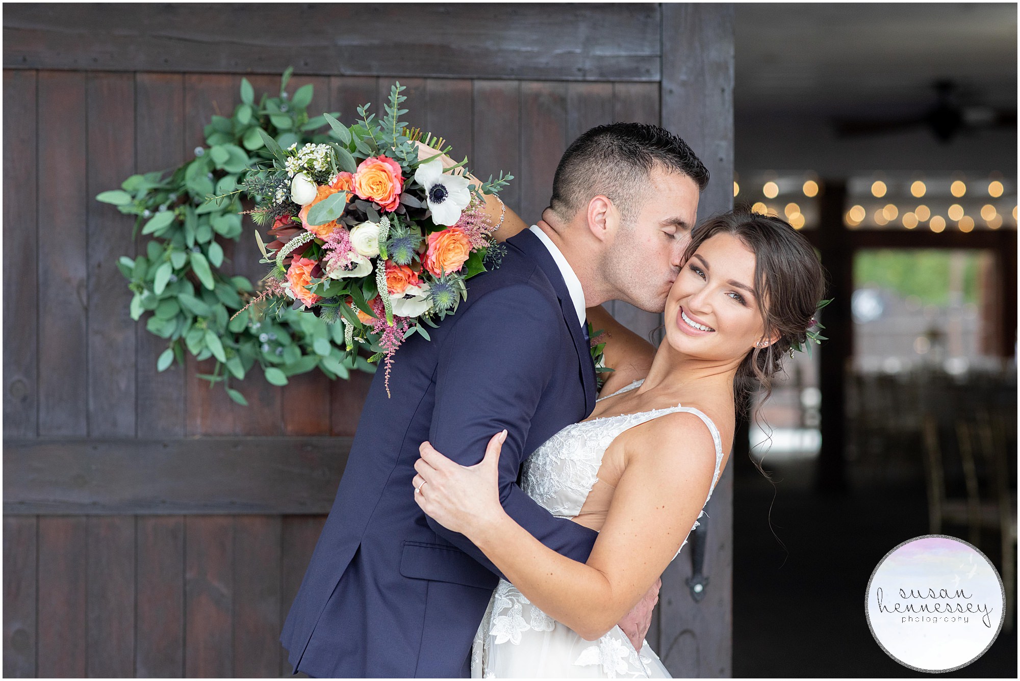 Rustic barn door is great for portraits at The Hamilton Manor