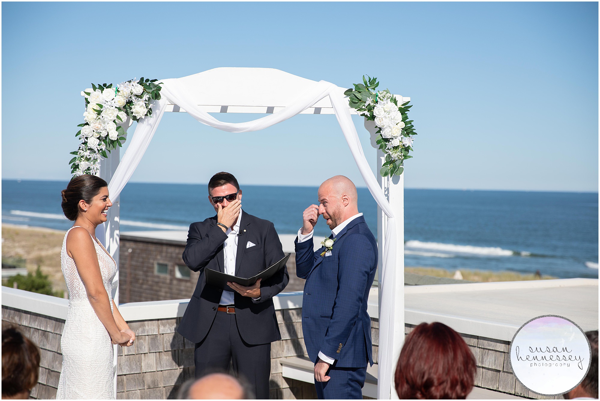 Emotional groom and officiant at Long Beach Island Microwedding