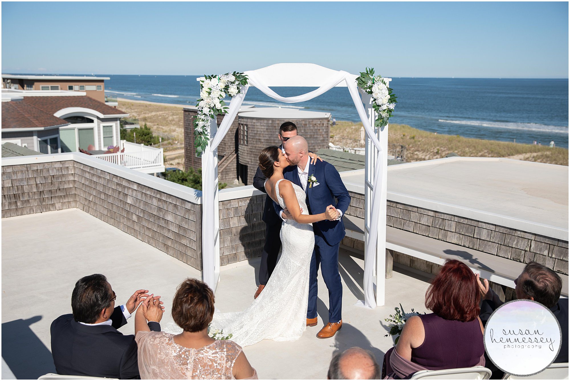 Bride and groom kiss for first time at Long Beach Island Microwedding