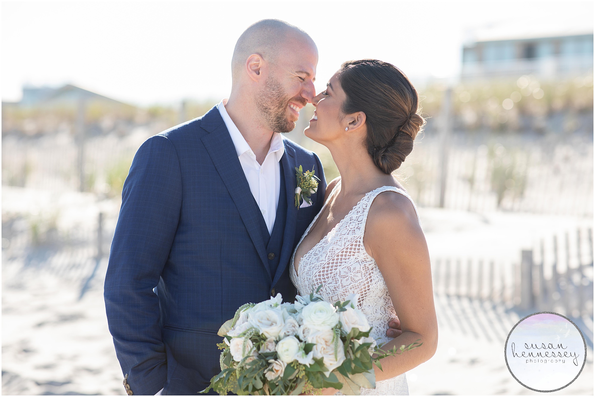 Happy bride and groom on jersey shore for Long Beach Island Microwedding