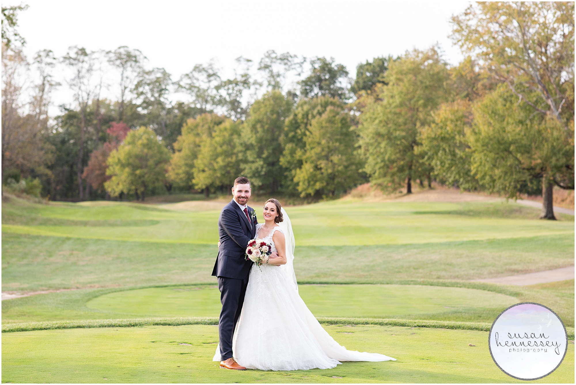 Bride and groom portraits following ceremony at Wedding at Old York Country Club