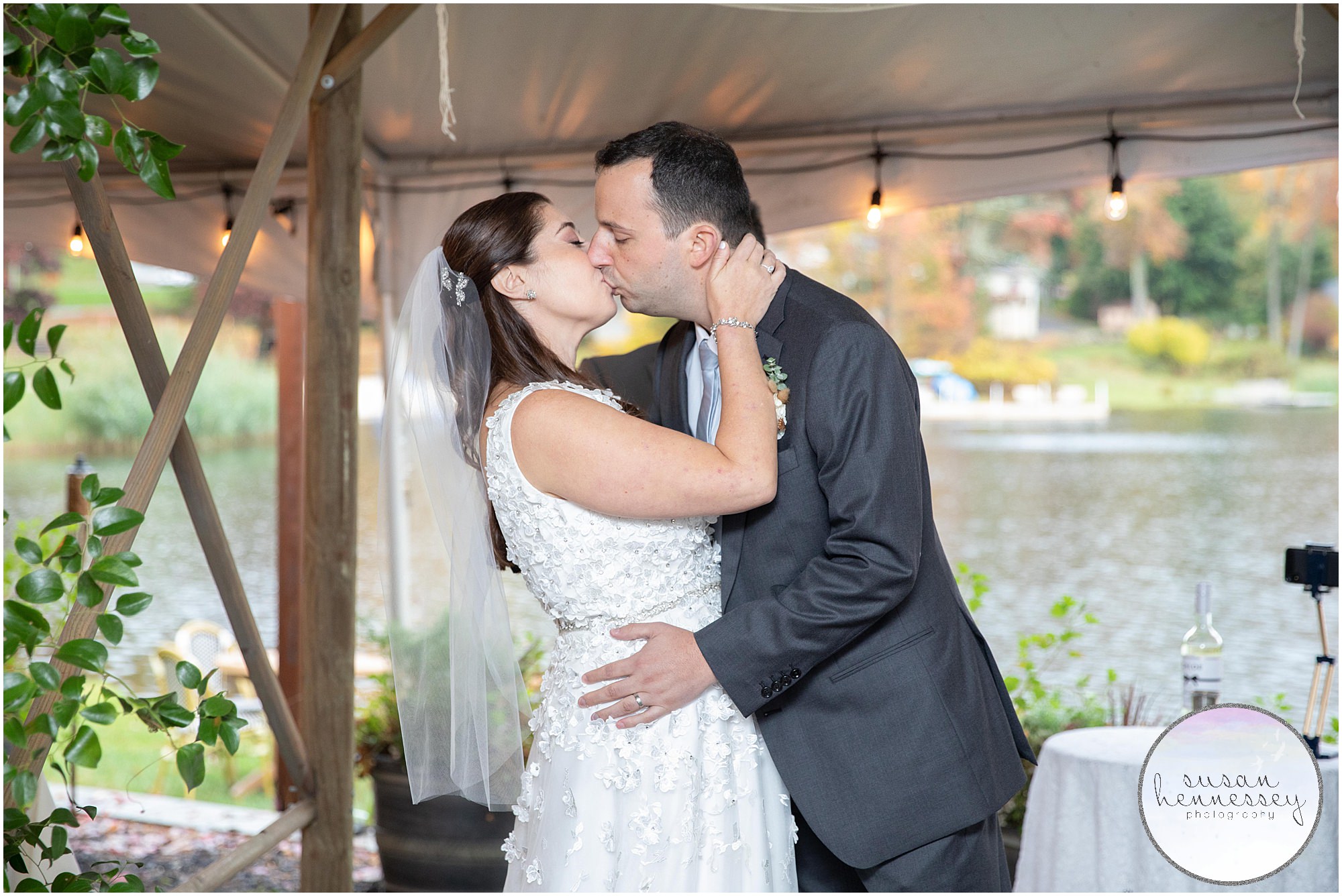 Bride and groom kiss at microwedding at Andre's Lakeside Dining