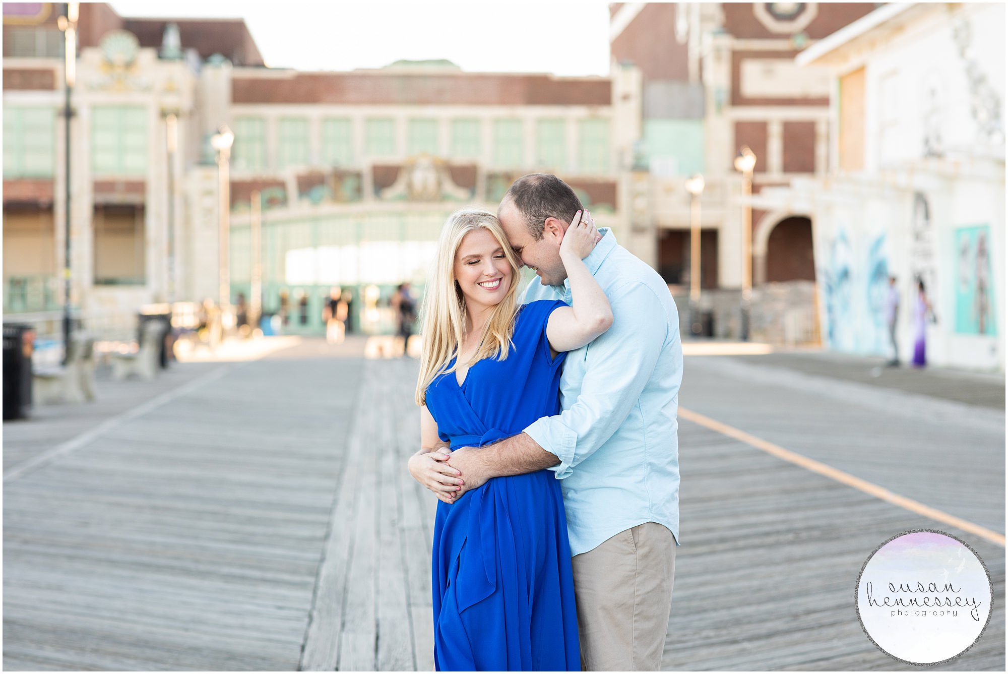 Engaged couple in shades of blue at Engagement Session at Asbury Park