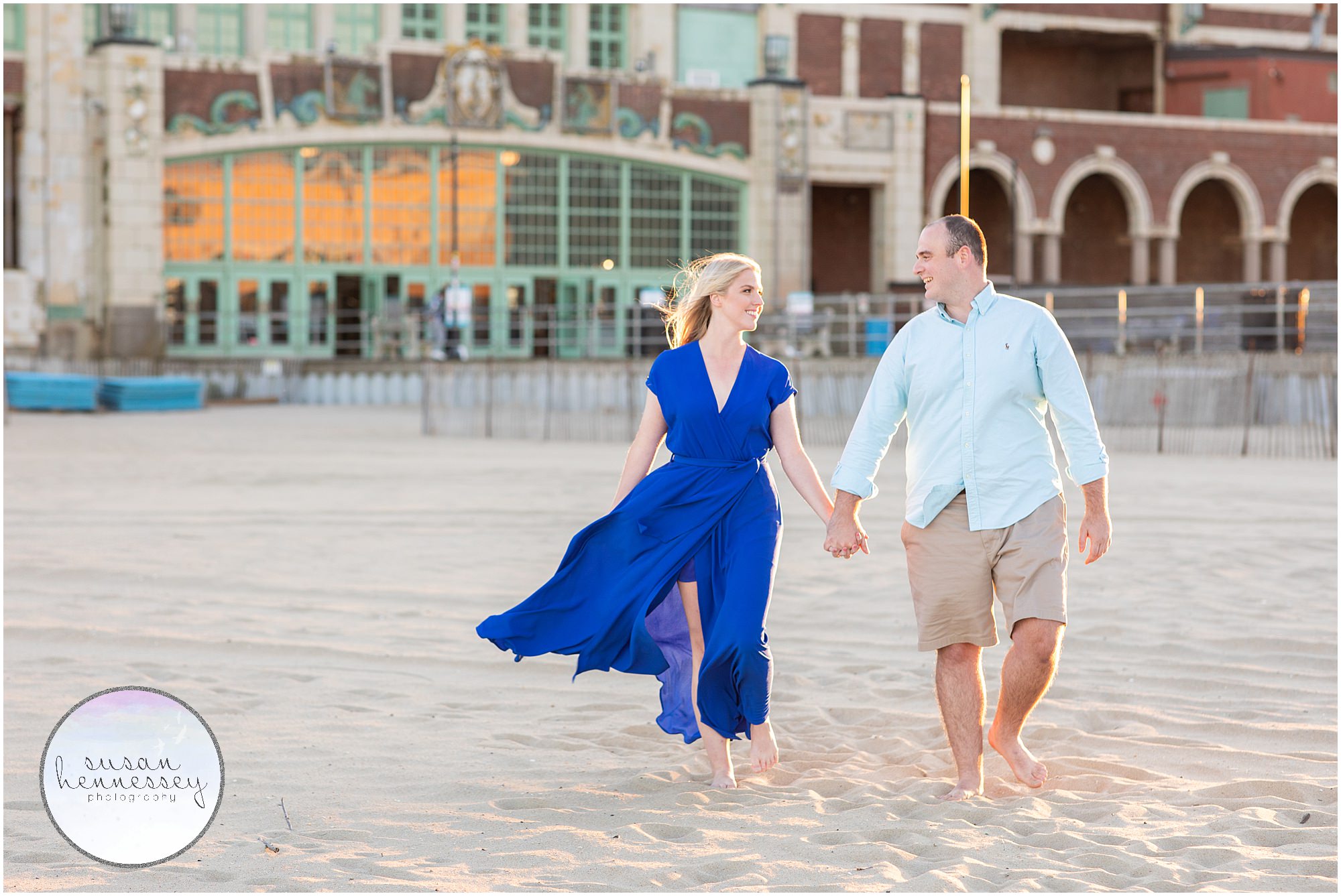 Engagement Session at Asbury Park with couple walking on the beach during sunset