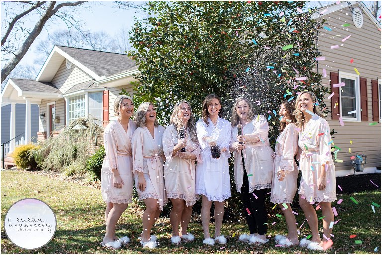 Susan Hennessey Photography Best of 2020 Weddings - The Merion in Cinnaminson bride and bridesmaids pop champagne and confetti