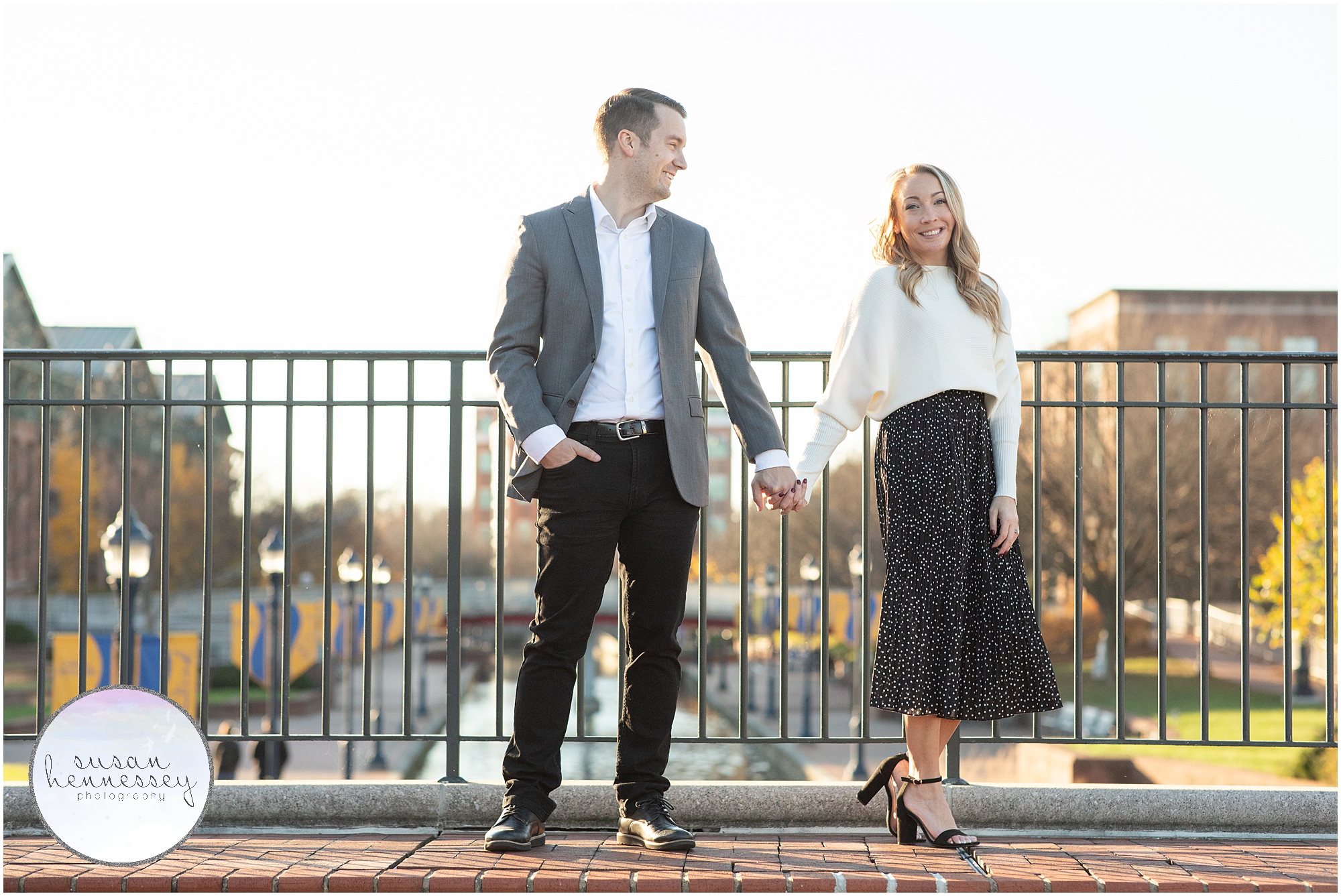 downtown Frederick engagement session at sunset overlooking the river.