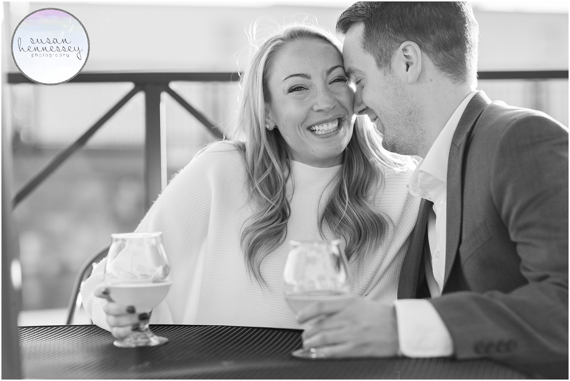 A black and white portrait of a couple at their downtown Frederick engagement session