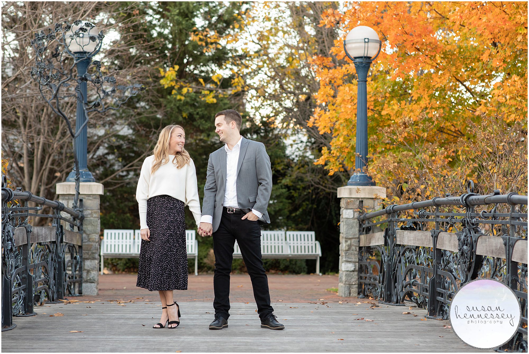 A happily engaged couple at their downtown Frederick engagement session 