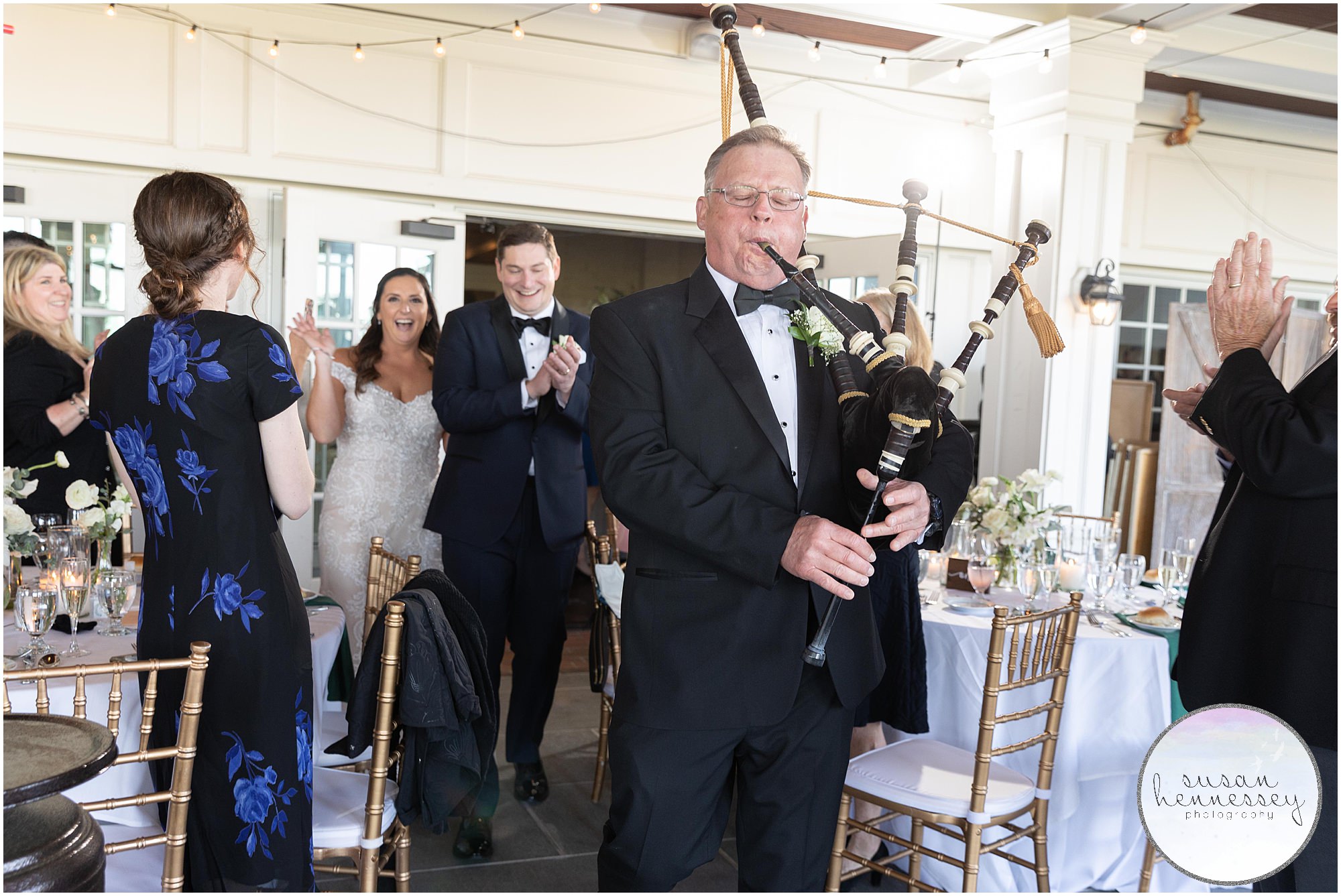 Bride and groom enter their reception with bagpipes at Atlantic City Country Club Wedding