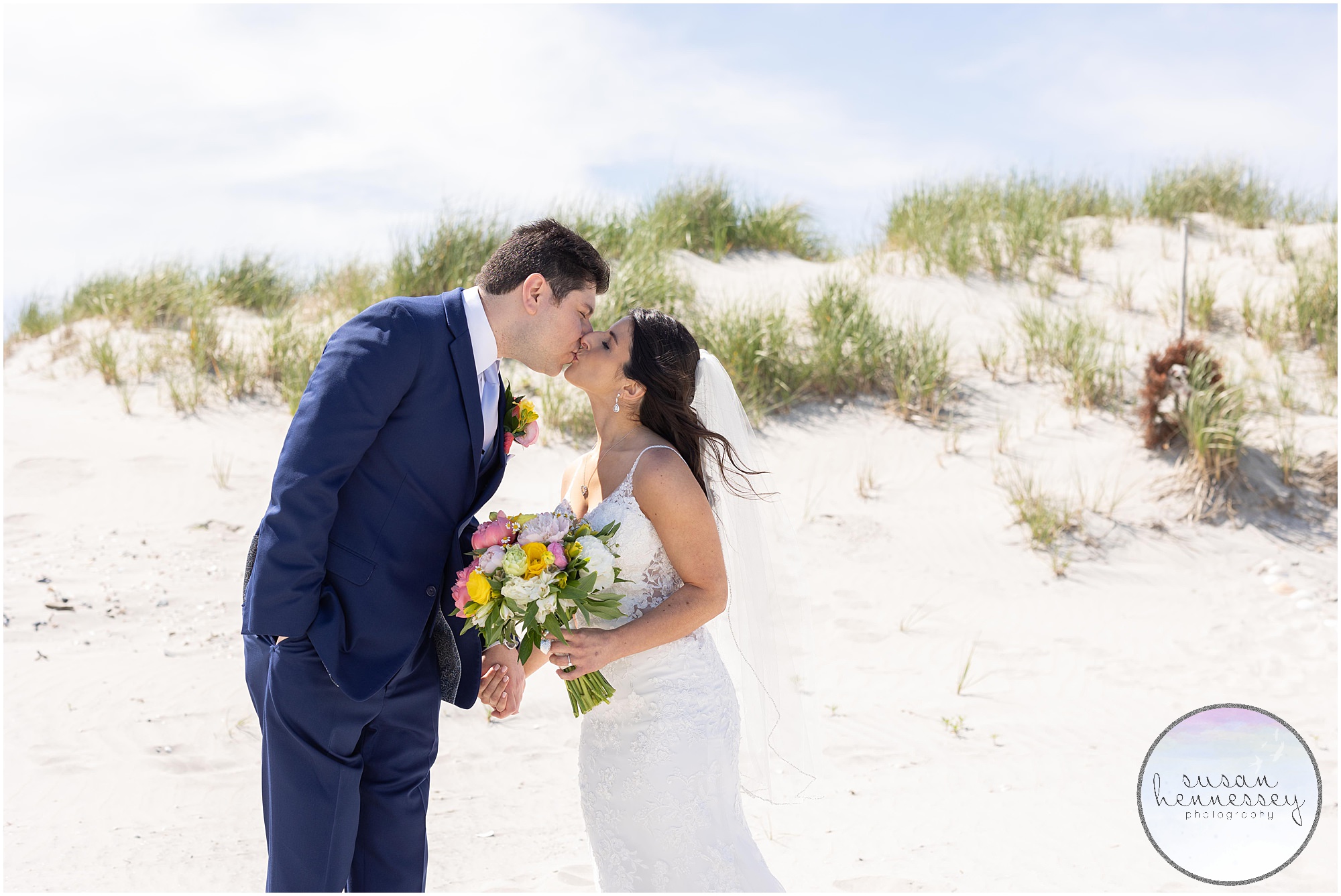 Bride and groom by the dunes at ICONA Avalon Wedding