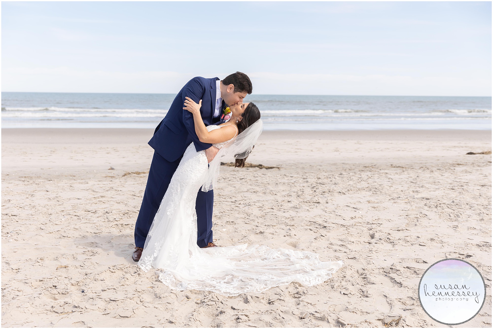 Romantic photograph of bride and groom on the beach at their ICONA Avalon Wedding