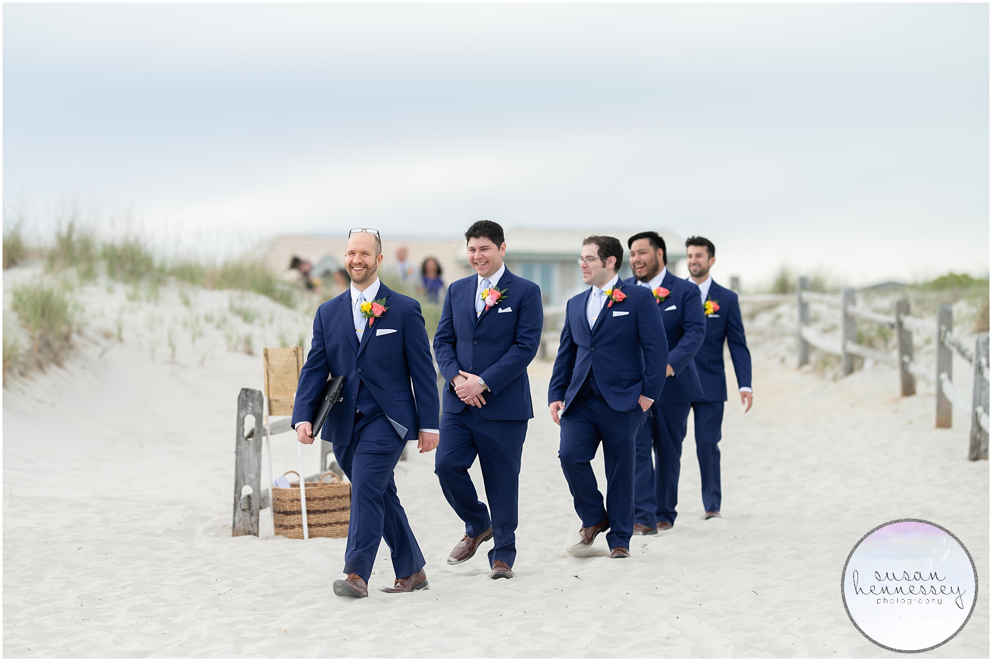 Groom and groomsmen walk to ceremony at ICONA Avalon wedding