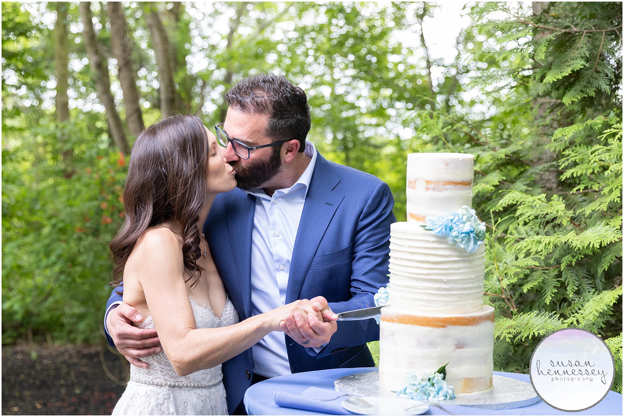 Bride and groom cut cake at South Jersey Backyard Wedding