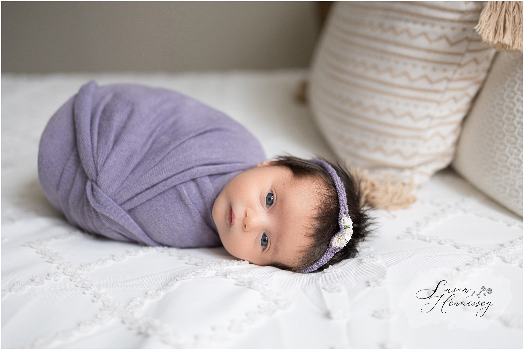 Lifestyle newborn photos taken in studio by Susan Hennessey Photography. 
