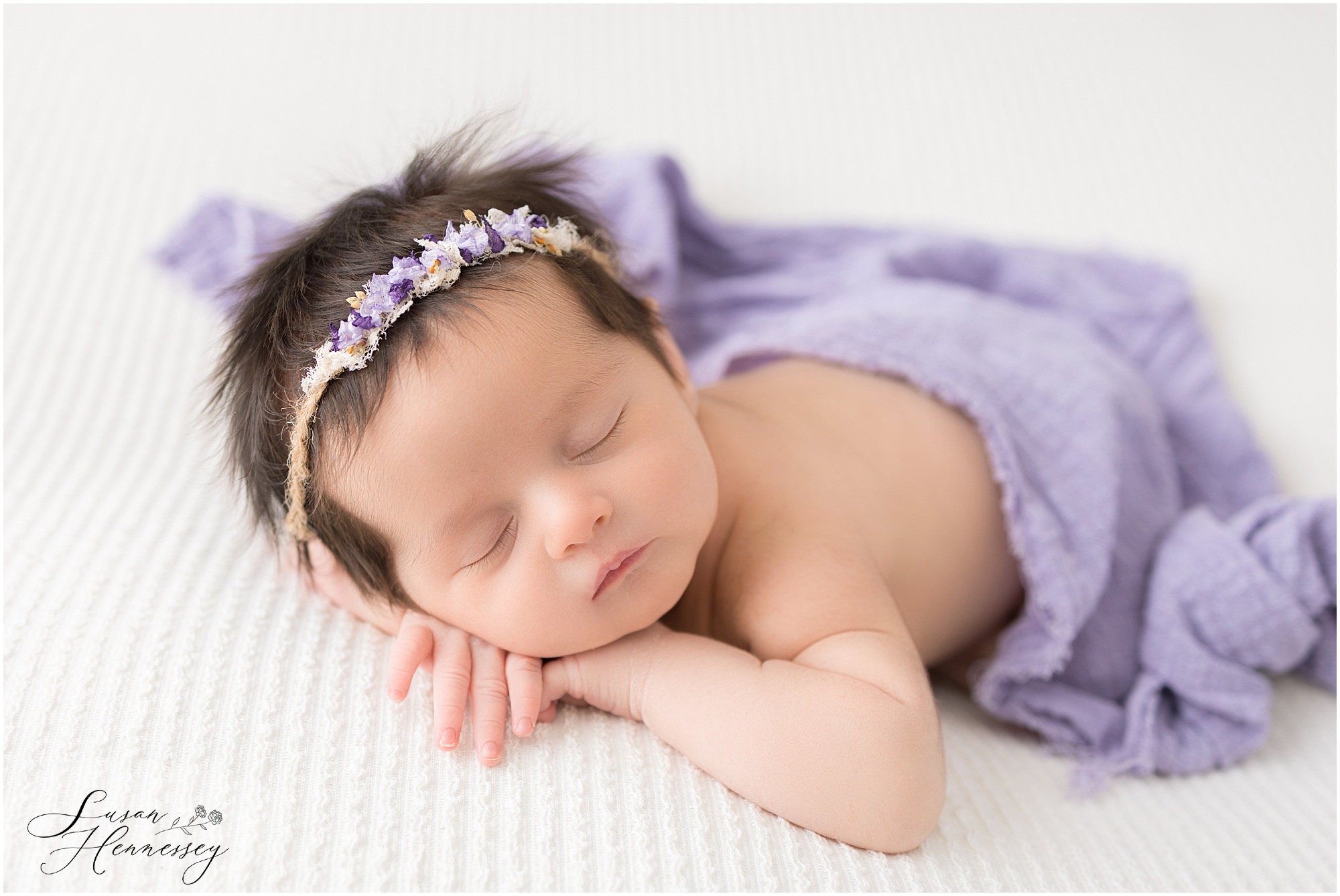 Purple and cream newborn session for a baby girl. 