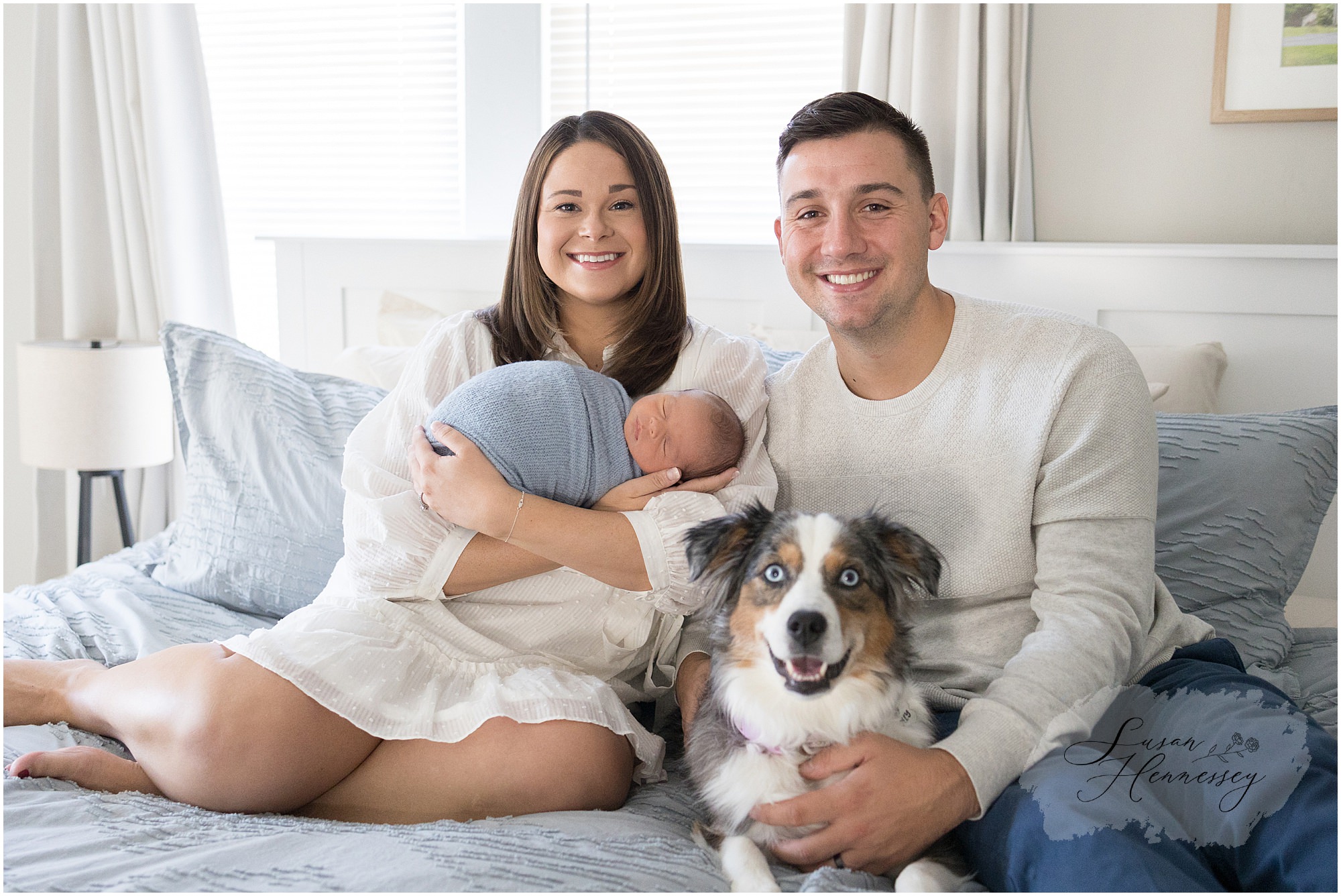 In Home Newborn Photographer with the family dog.