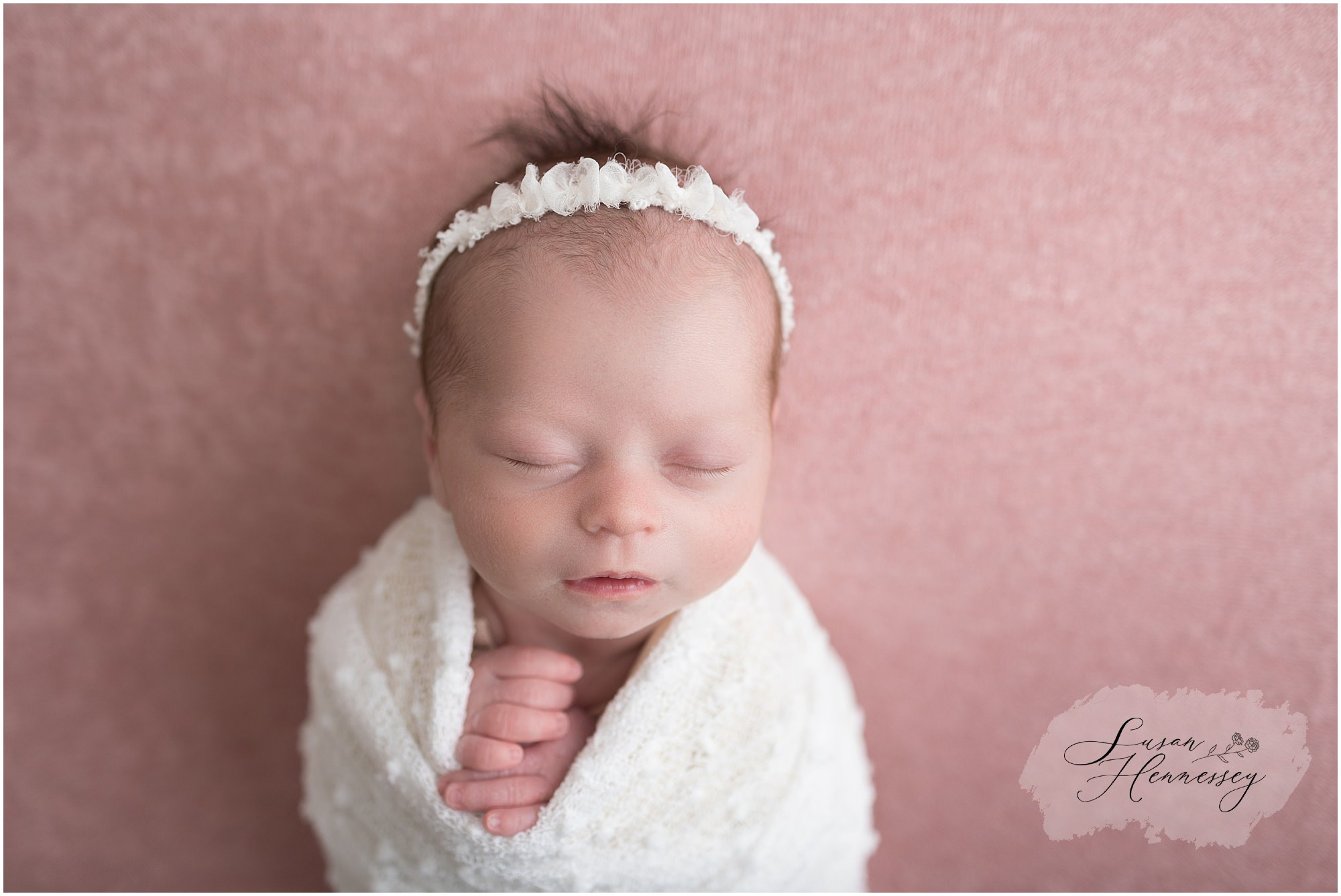 Close up of sleeping newborn baby girl in South Jersey newborn photography studio