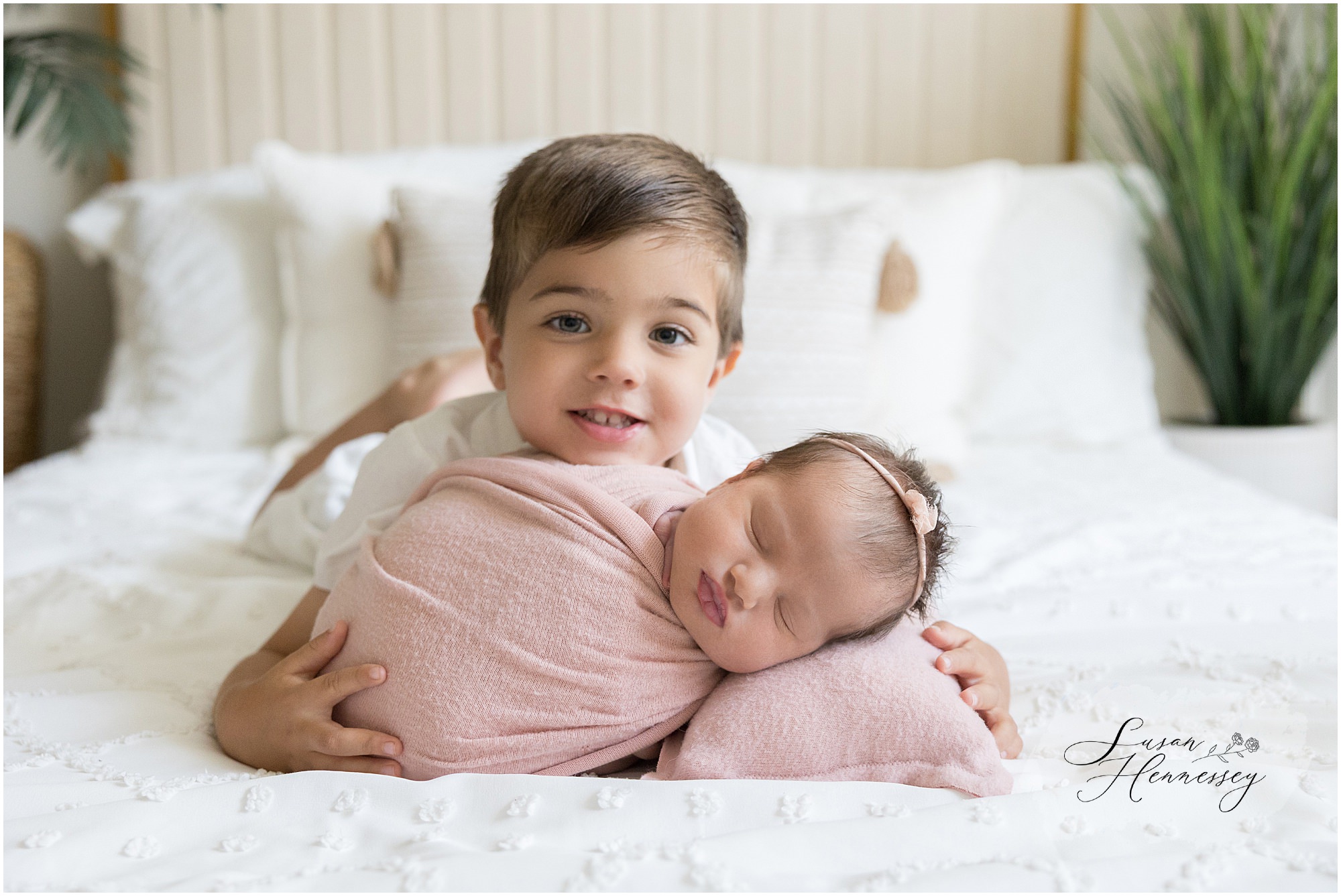Newborn sibling photography with big brother and baby Colette