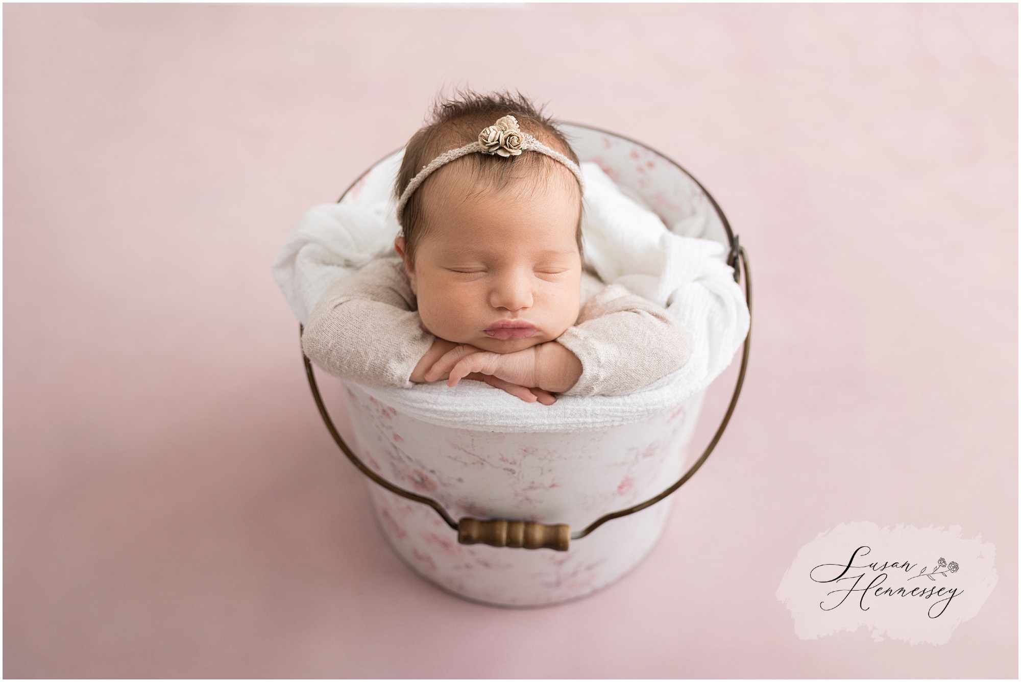 Timeless solo newborn portraits of baby Colette in soft pinks