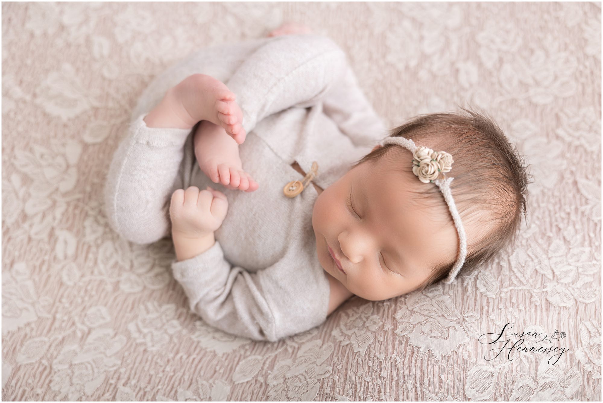 Classic studio newborn photography with neutral color palette