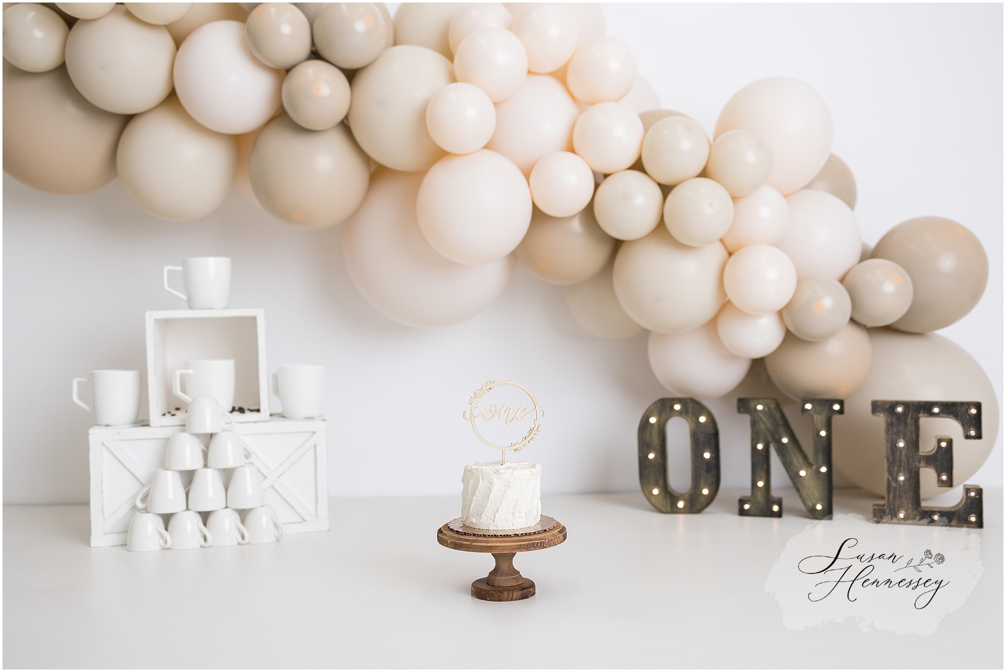 baby girl first birthday cake smash session cup of jo theme