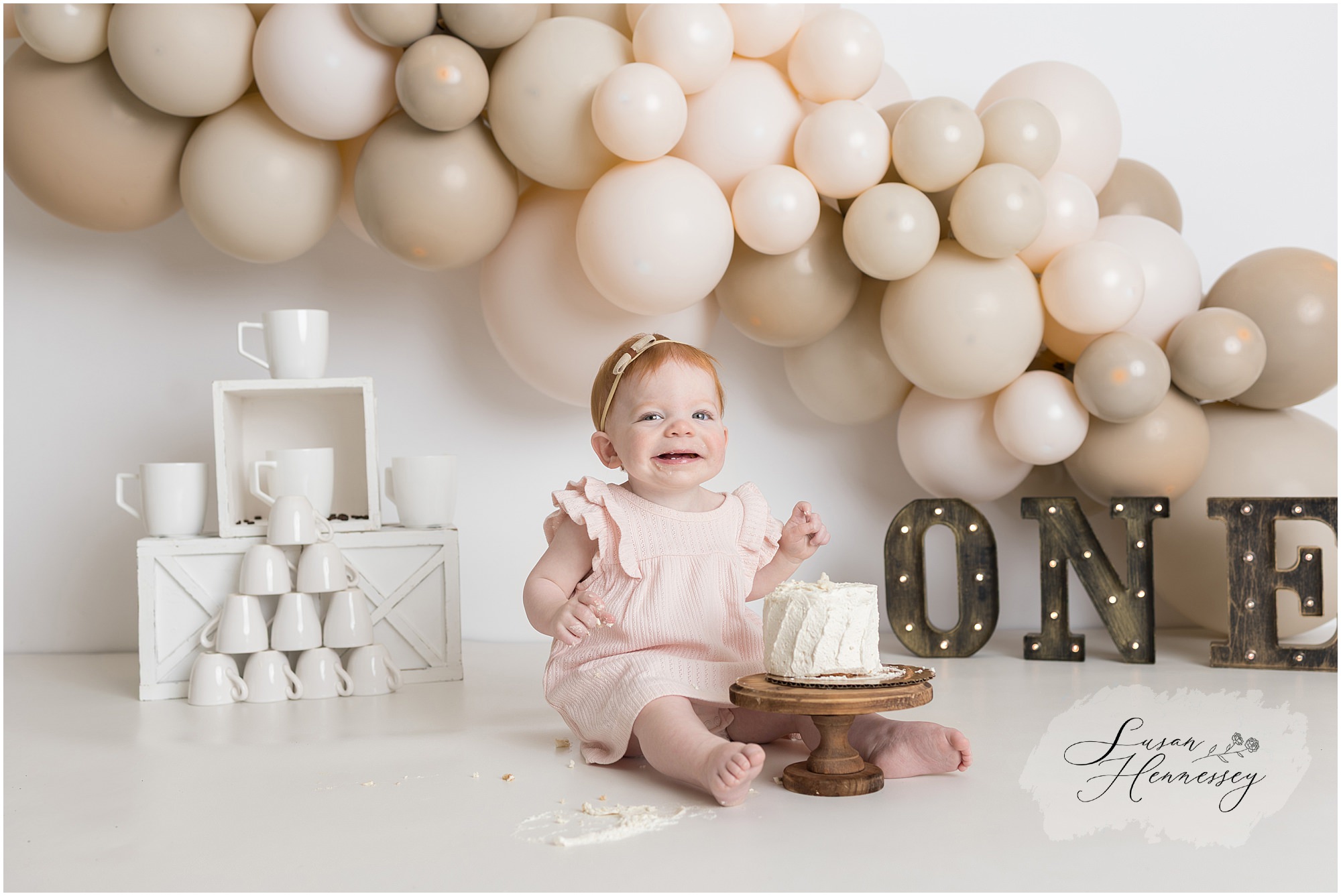 coffee themed first birthday cake smash session studio setup