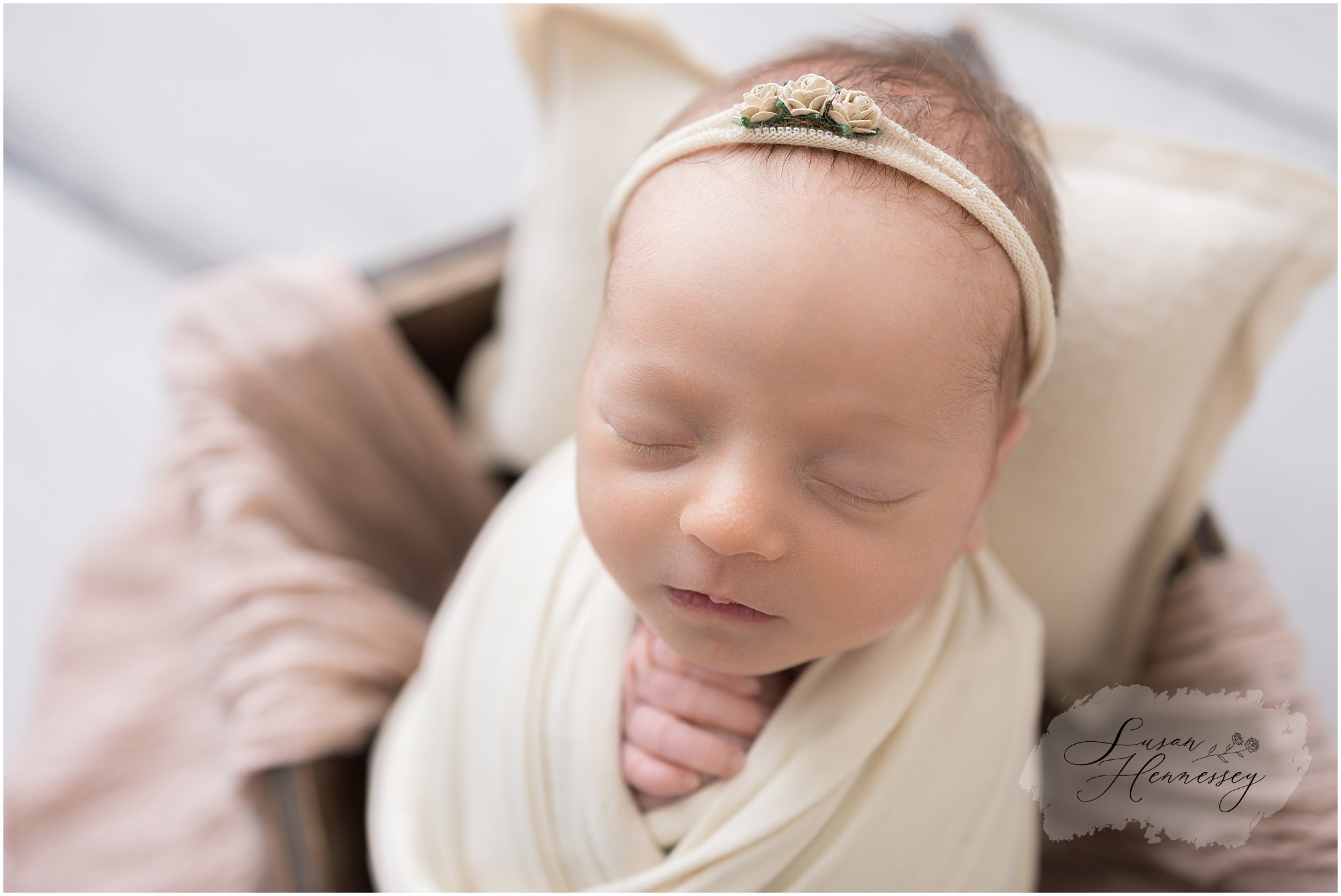 baby girl newborn session with pink and cream styling South Jersey