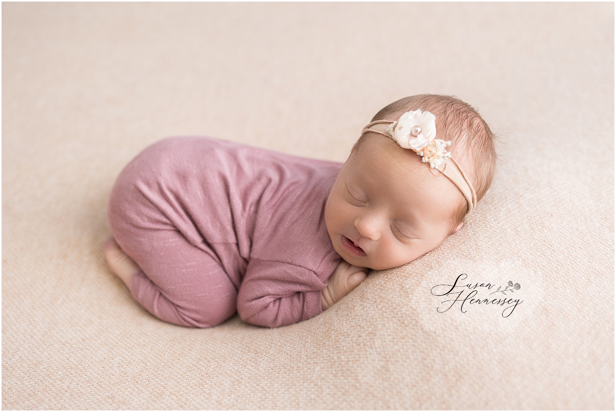 newborn milestone style posing in neutral studio setting