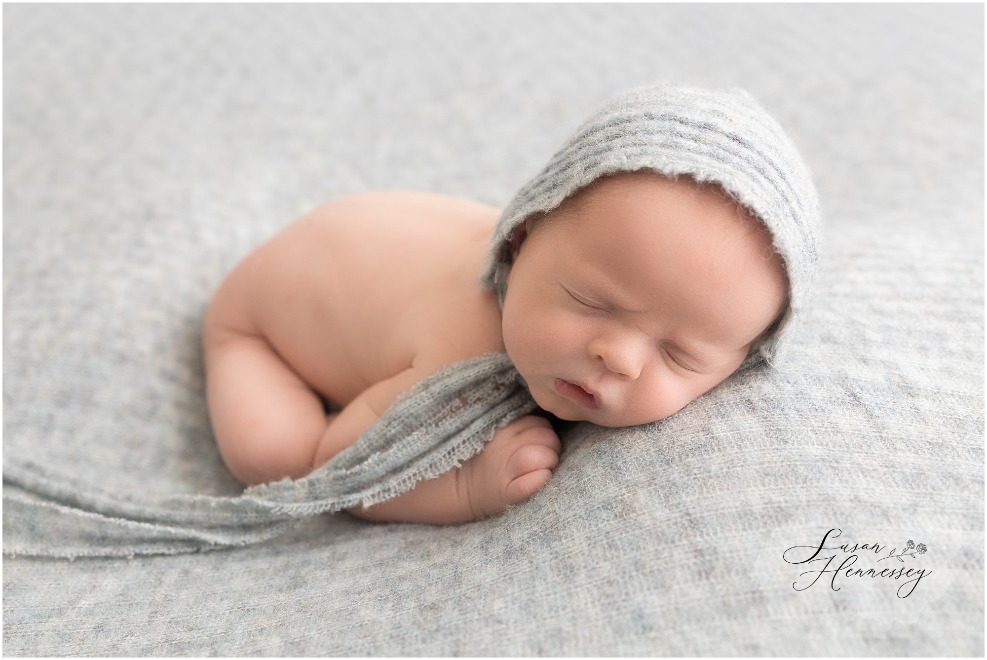Newborn portrait session in South Jersey featuring baby Jack and timeless blue styling.