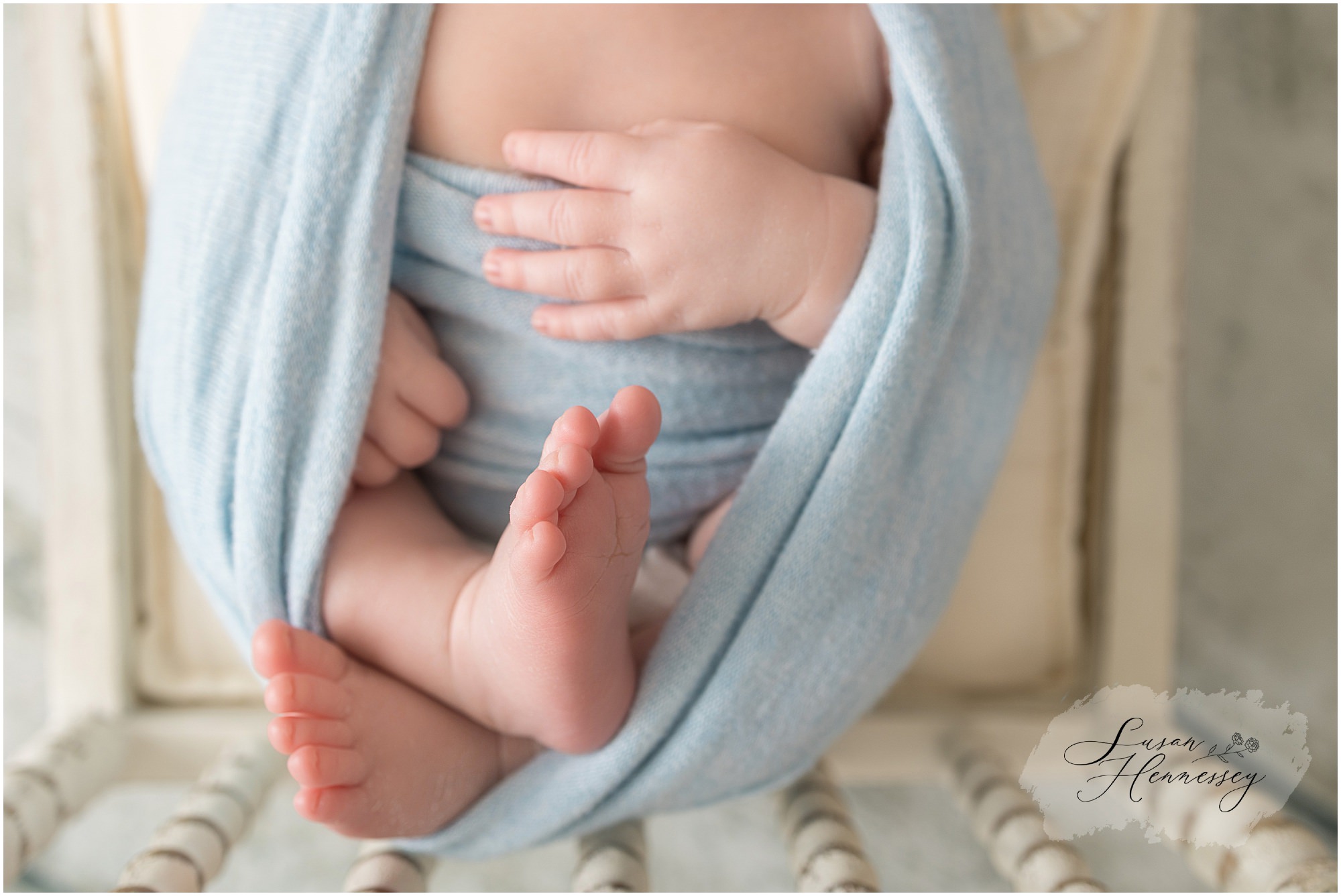 Baby Jack's tiny hands and feet photographed during a South Jersey studio newborn session.
